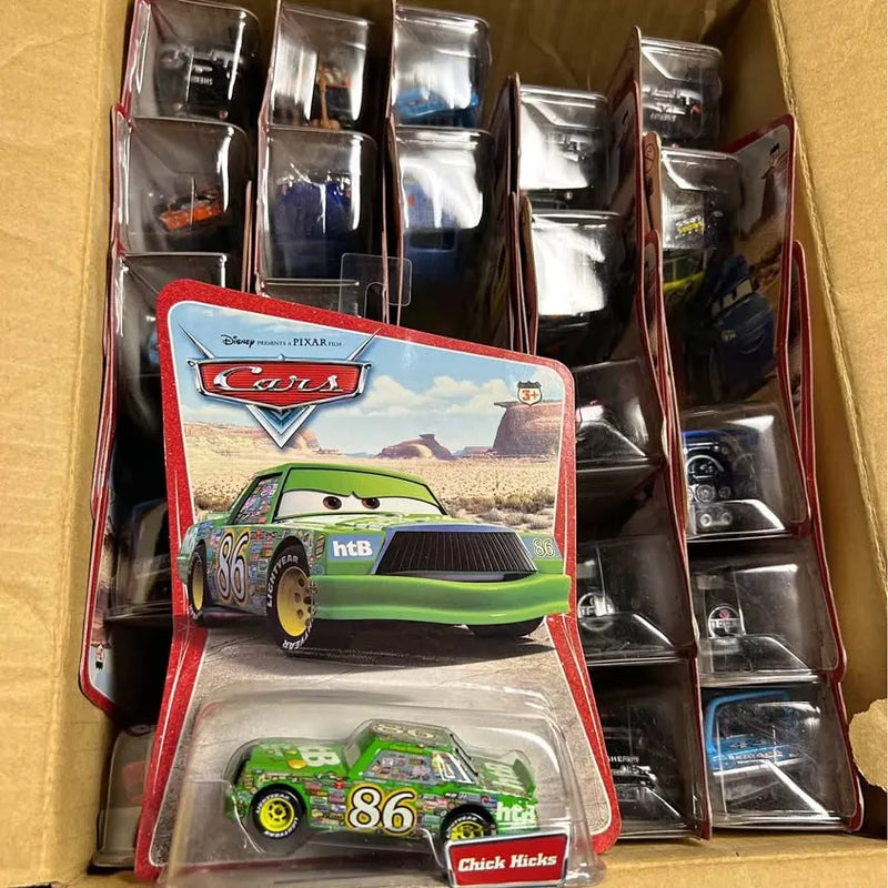 Green diecast race car with number 86 in clear blister packaging