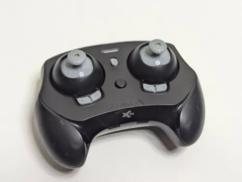 Black handheld remote control with two thumb joysticks and trigger buttons