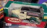 1:24 diecast bank model of a 1947 Dodge canopy delivery truck, cream body with dark top