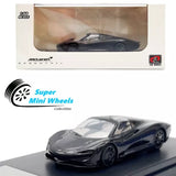 Black 1:64 diecast sports car model with detailed body and wheels on display