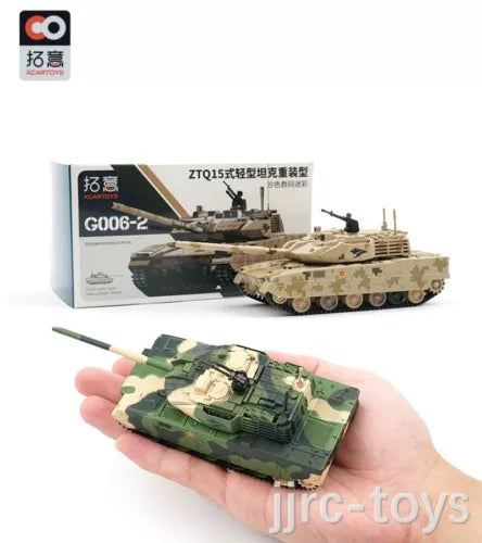1:64 heavy armor tank diecast model car in camouflage, detailed tracks, held in hand