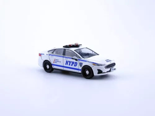 NYPD police car diecast model, white Ford sedan with blue stripe and NYPD logo