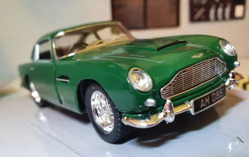 Aston Martin DB5 green diecast car, chrome front grille and headlights