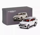 Diecast metal model car of Lexus LX600, white, in display box