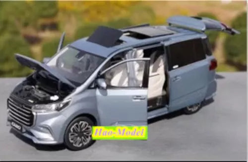 Blue diecast MPV model car with front-left door open, 1:18 scale