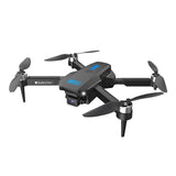 Foldable quadcopter drone with front camera, four propellers, and landing lights