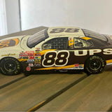 NASCAR diecast race car, black with yellow UPS logo and large 88 on doors