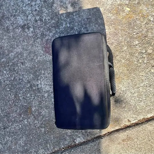 Dark rectangular drone carrying case pouch with zipper and mesh side pocket