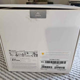 White product box with barcode and compliance label stickers