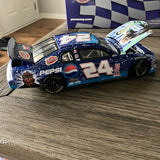 Blue #24 die-cast race car with Star Wars graphics and opening cockpit window