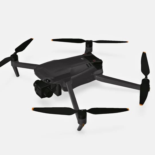 Black quadcopter drone with four propellers and front camera module
