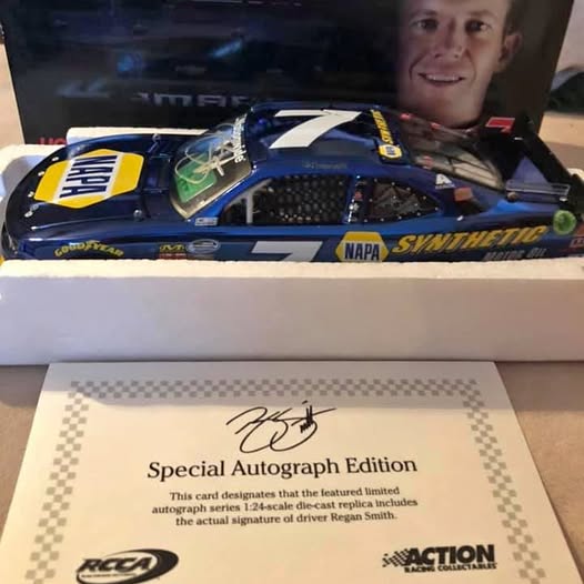 Blue NASCAR diecast car #7 with driver autograph and Special Autograph Edition card