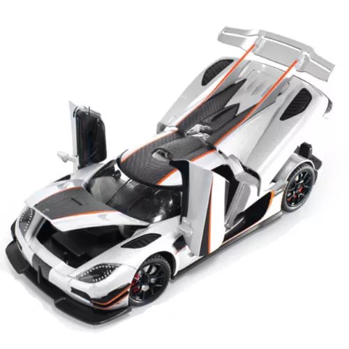 Silver and black diecast model car with orange racing accents, 1:24 scale