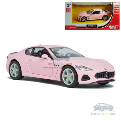 Maserati GT pink alloy diecast model car, front three-quarter view, sporty details