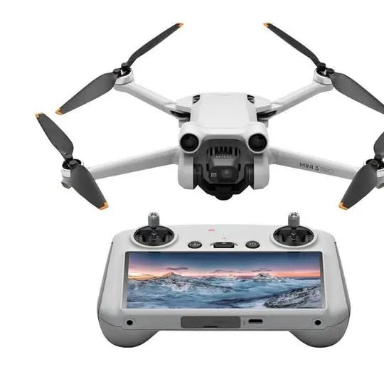 Foldable white quadcopter drone with controller and built-in screen
