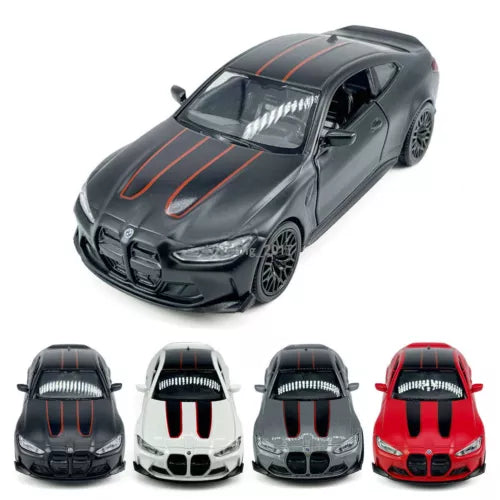 Dark gray diecast toy car model with orange racing stripes, front view