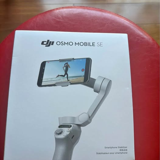 DJI Osmo Mobile SE smartphone stabilizer box with gimbal handle and phone mount