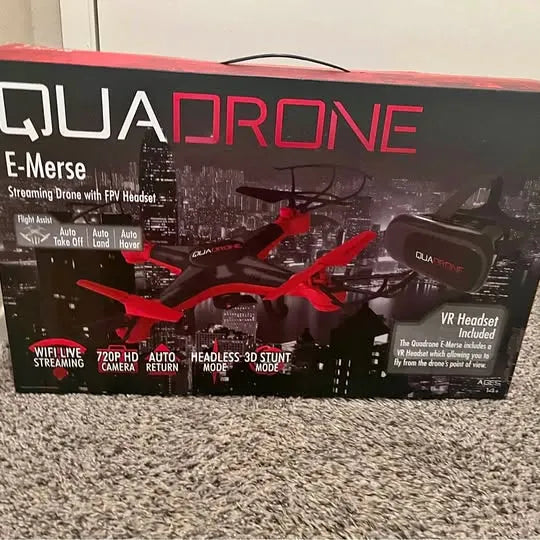 Drone product box with red quadcopter illustration and feature callouts, black background