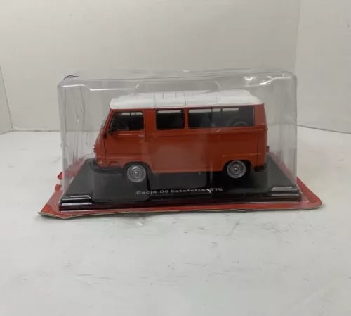 1:24 diecast van model in clear display case, orange-red, front view