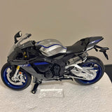 Diecast model sport motorcycle, black and blue with silver details