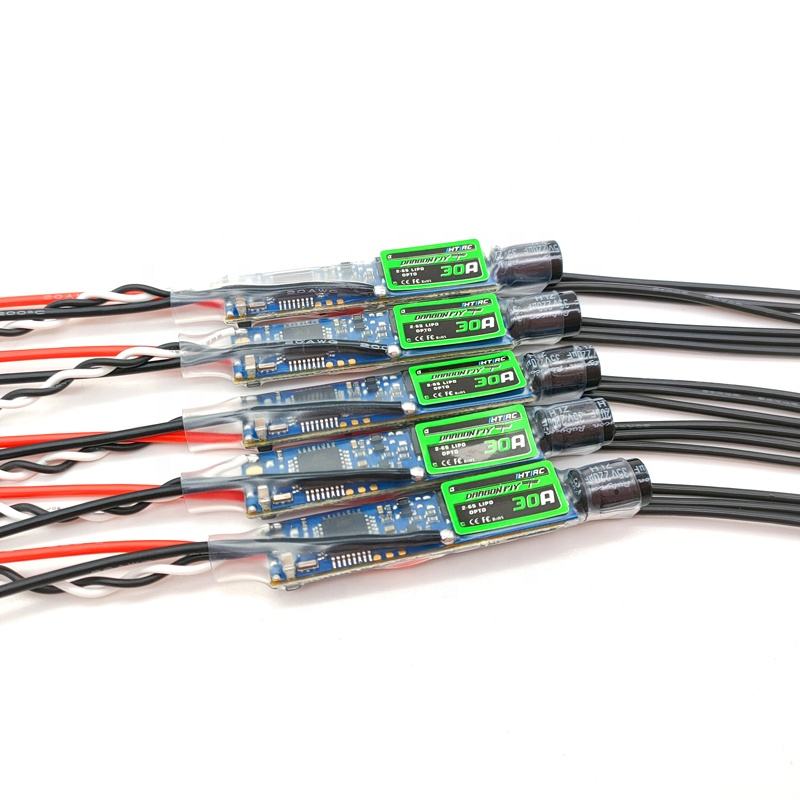 RC brushless ESC speed controller circuit board with 30A green modules and wiring leads