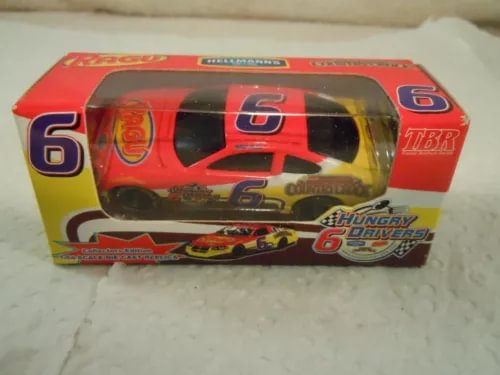 Red #6 diecast race car model in clear display box