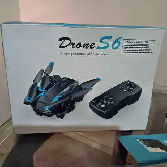 Drone S6 aerial drone with black body and blue accents, paired with black remote controller
