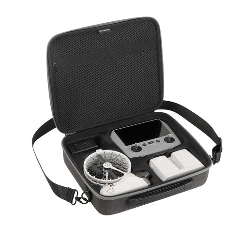 Hard-shell drone carrying case with shoulder strap, open interior with drone and accessories