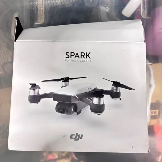 DJI Spark Fly More Combo drone package with printed drone and SPARK logo