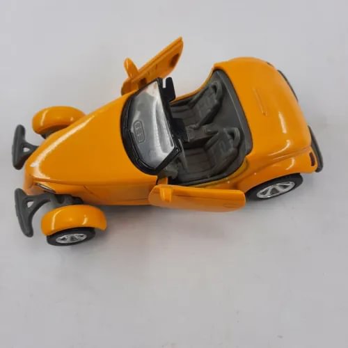 Yellow diecast car with open cockpit and black interior