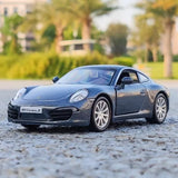 Alloy diecast sports car model, dark blue, front three-quarter view on wheels