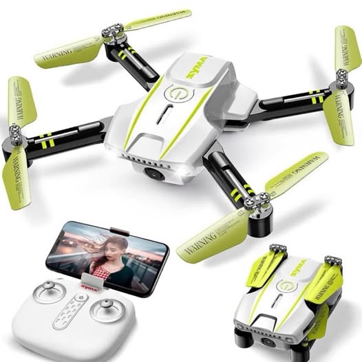 RC quadcopter drone with remote controller and smartphone display, green prop guards