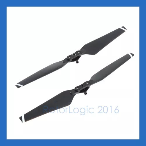 Pair of black drone propellers with mounting hubs