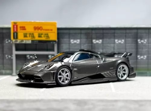 Gray 1:64 sports model diecast car with rear spoiler, metal body, detailed wheels