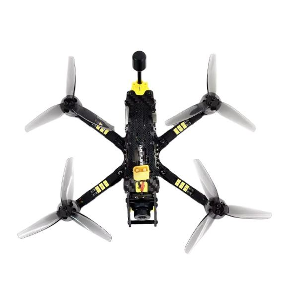 Analog FPV freestyle quadcopter drone with 3.5in frame, black body and four white propellers