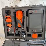 Drone accessories kit in hard case with controller and orange drone