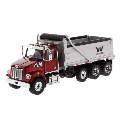 Diecast Masters 1/50 dump truck model with red cab and silver dump body, front view