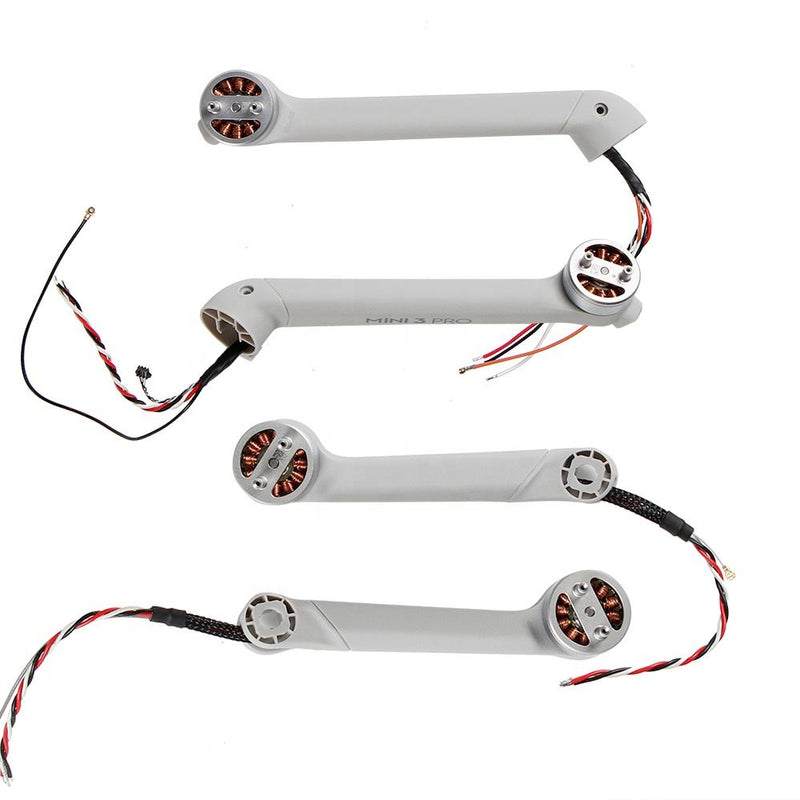 Drone motor arm assembly with wiring harness, white plastic, circular motor mounts.