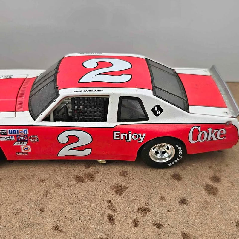 Red diecast race car with black roof, number 2, Dale Earnhardt and Coke logos