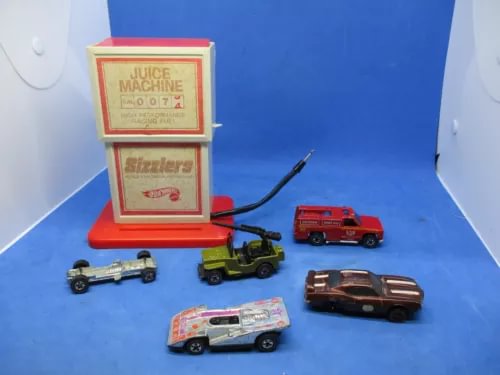 Diecast car parts set with several small vehicles and storage boxes