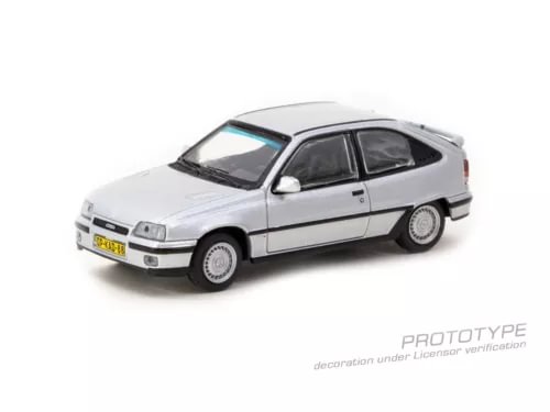 Silver diecast model car of an Opel Kadett GSi, side view