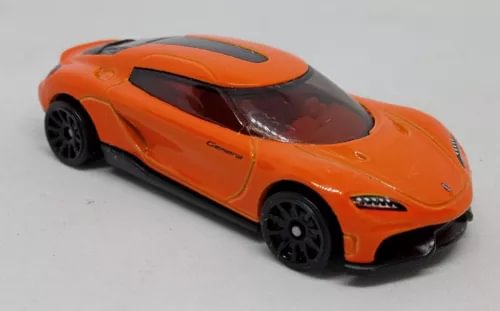 Orange diecast sports car with black wheels and dark-tinted windshield