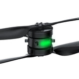 Brushless drone motor with green LED and mounting arms