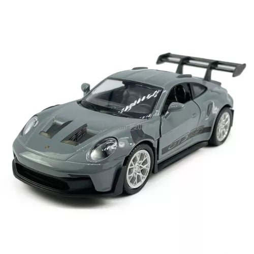 Gray diecast model car, 1:36 scale, front 3/4 view with rear wing and detailed wheels