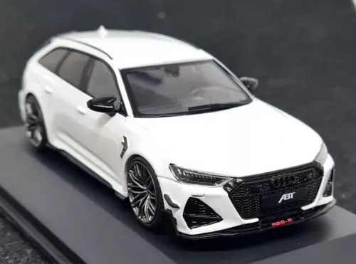 White diecast model car with ABT front grille, front three-quarter view
