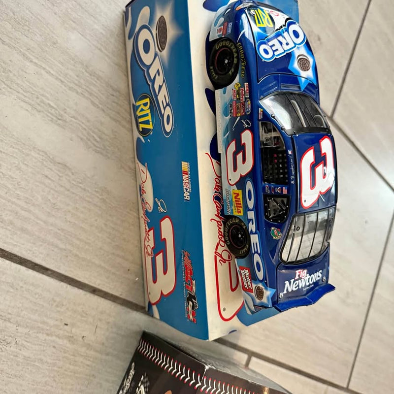 Blue NASCAR diecast race car with red and white #3 on box