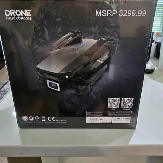 Foldable quadcopter drone in retail box, camera and obstacle-avoid feature shown