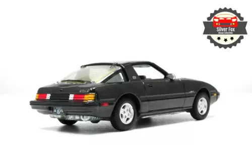 1982 Mazda RX-7 1:64 diecast model car, black rear three-quarter view