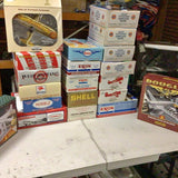 Diecast metal airplane boxed collectibles, stacked packaging with multiple aircraft labels