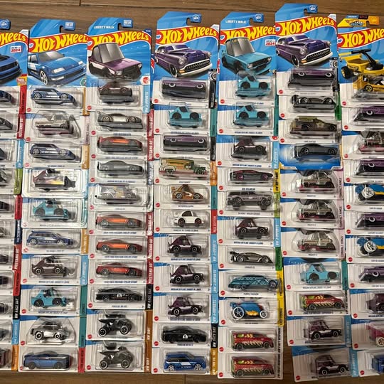 Hot Wheels diecast car assortment in blister-pack cards, assorted styles